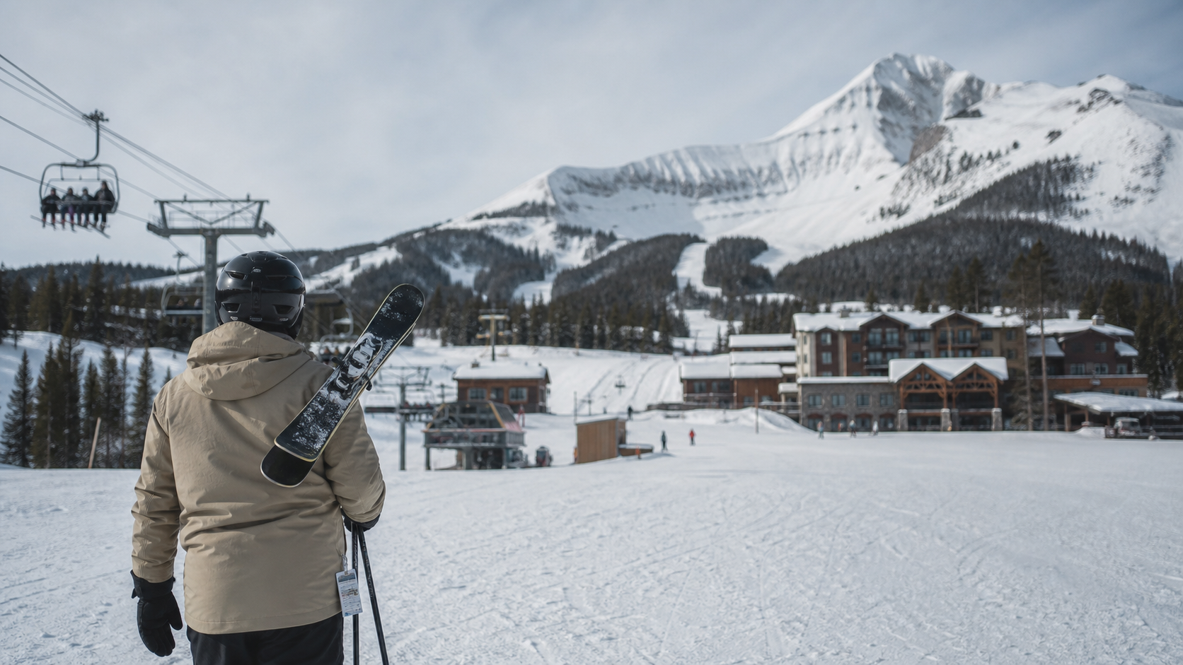 Illustration of a skier carrying skis at a snowy resort base